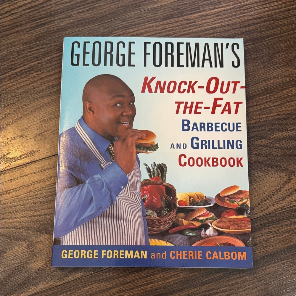 George Foreman's Knock-Out-the-Fat Barbecue and Grilling Cookbook - Blue Cover
